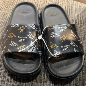 Reebok Black Slides with Gold Logo